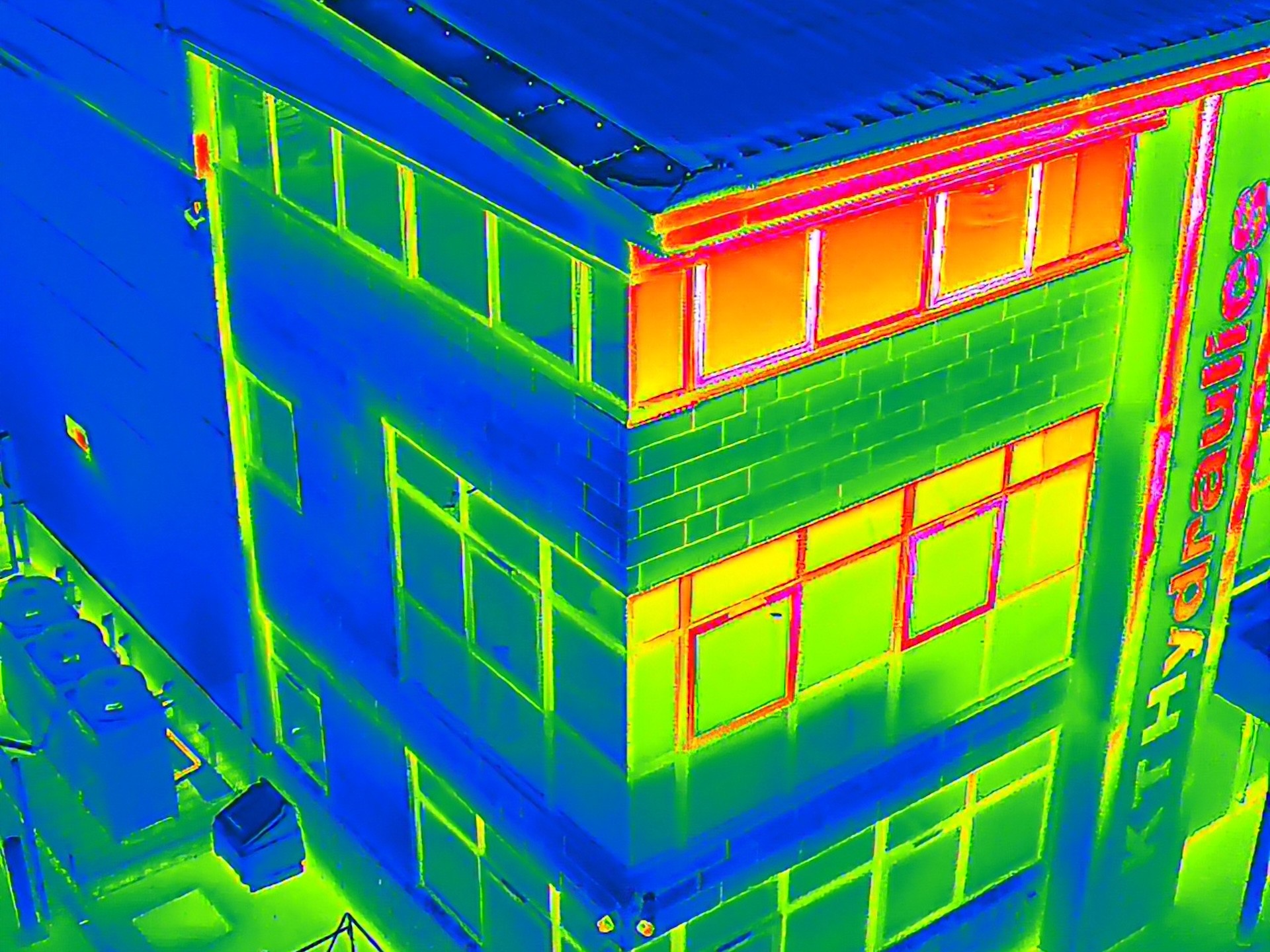 Thermal imaging showing heat loss and insulation issues on building exterior